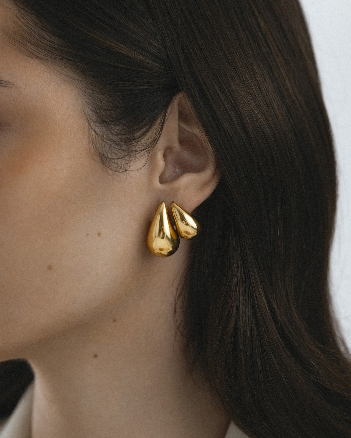 Plain daring small gold dupe earring