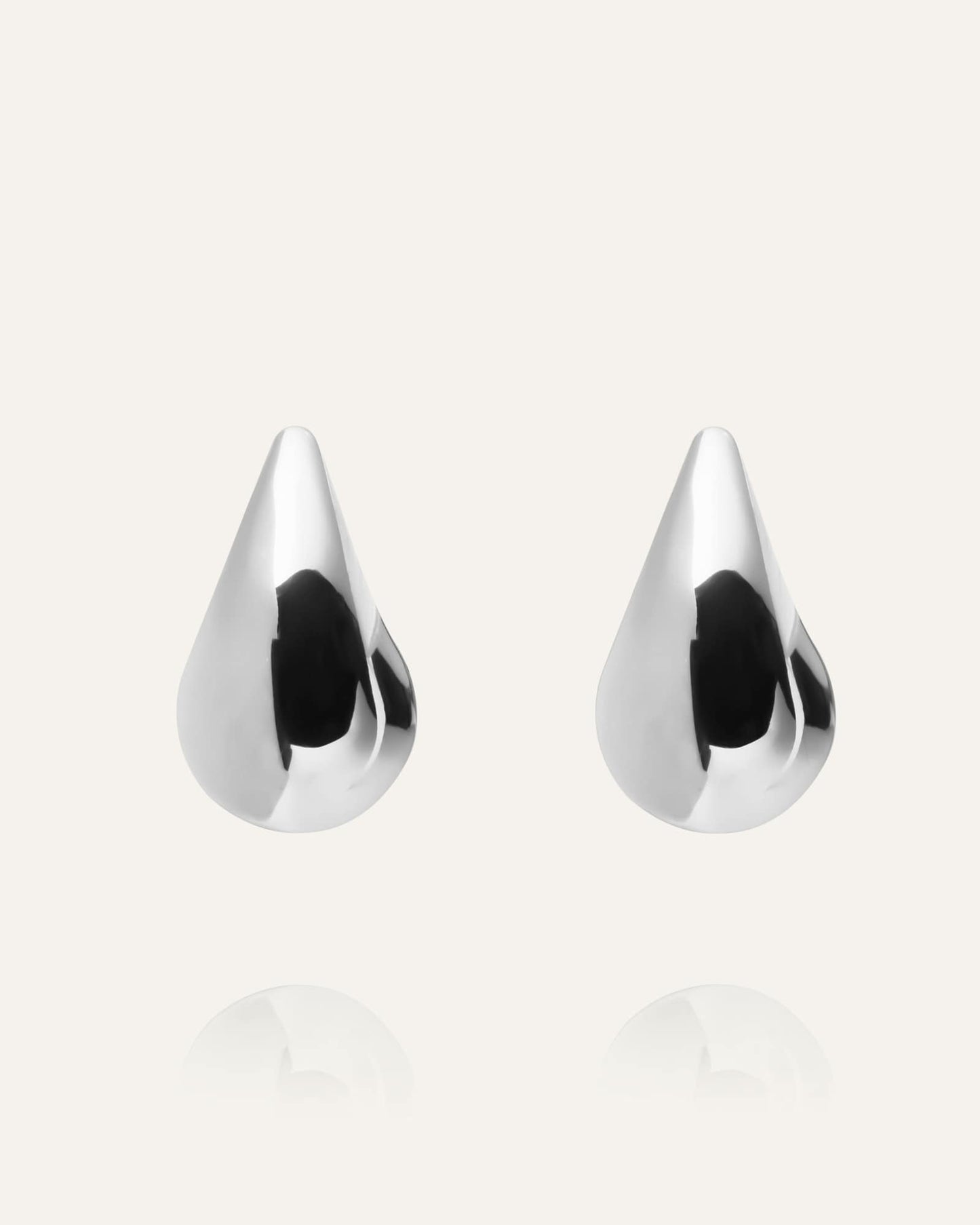 Plain daring large silver dupe earring