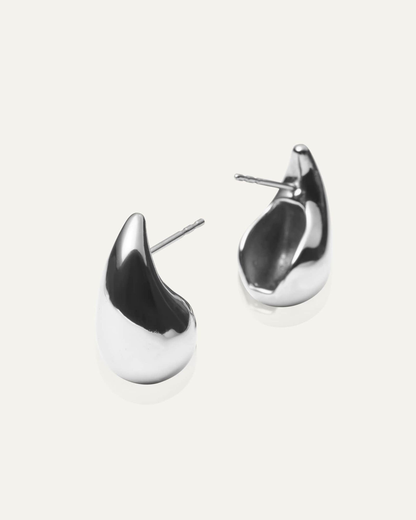 Plain daring large silver dupe earring