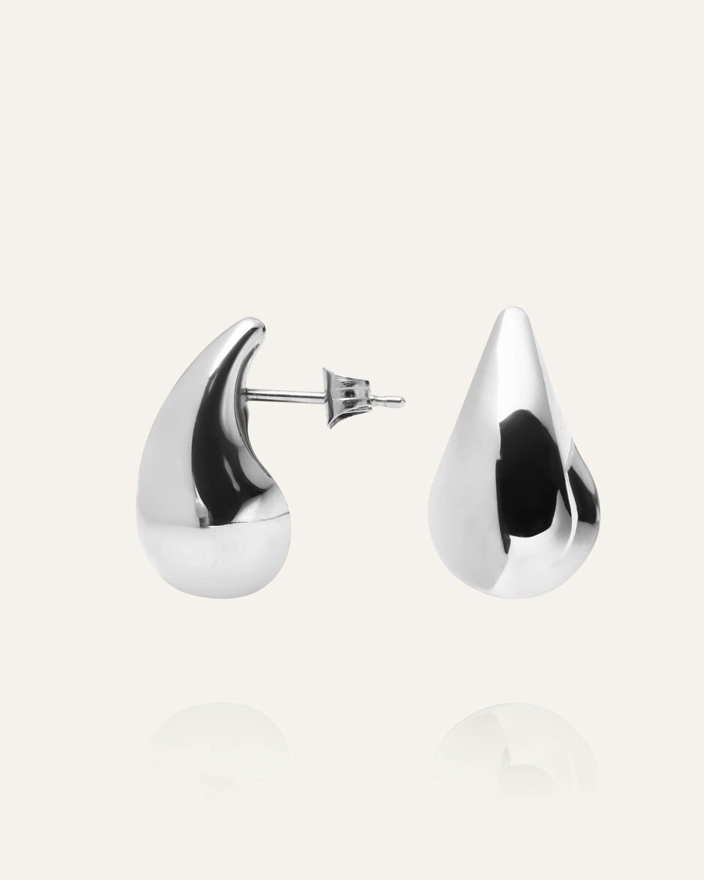 Plain daring large silver dupe earring